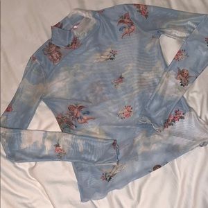 Sheer cherub angel long sleeve from Dolls Kill